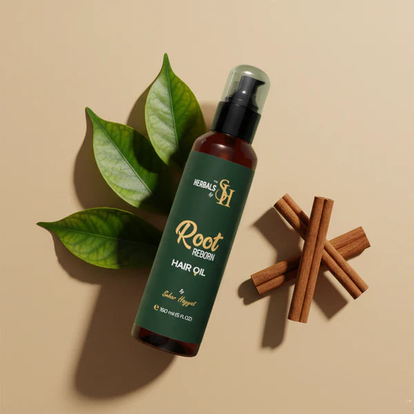 Herbals by SH herbal hair oil bottle in a flat lay style.