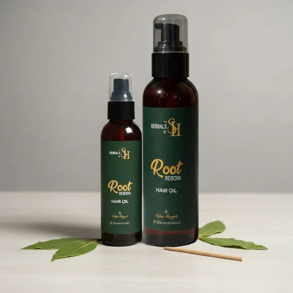 Root Reborn Hair Oil Duo (300ml & 150ml) Herbals by SH bottles with green leaves.