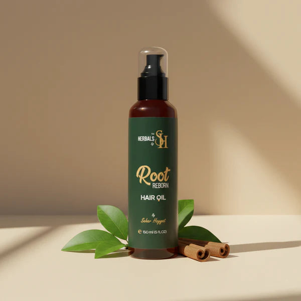 Root Reborn organic hair oil by Herbals by SH with cinnamon sticks.